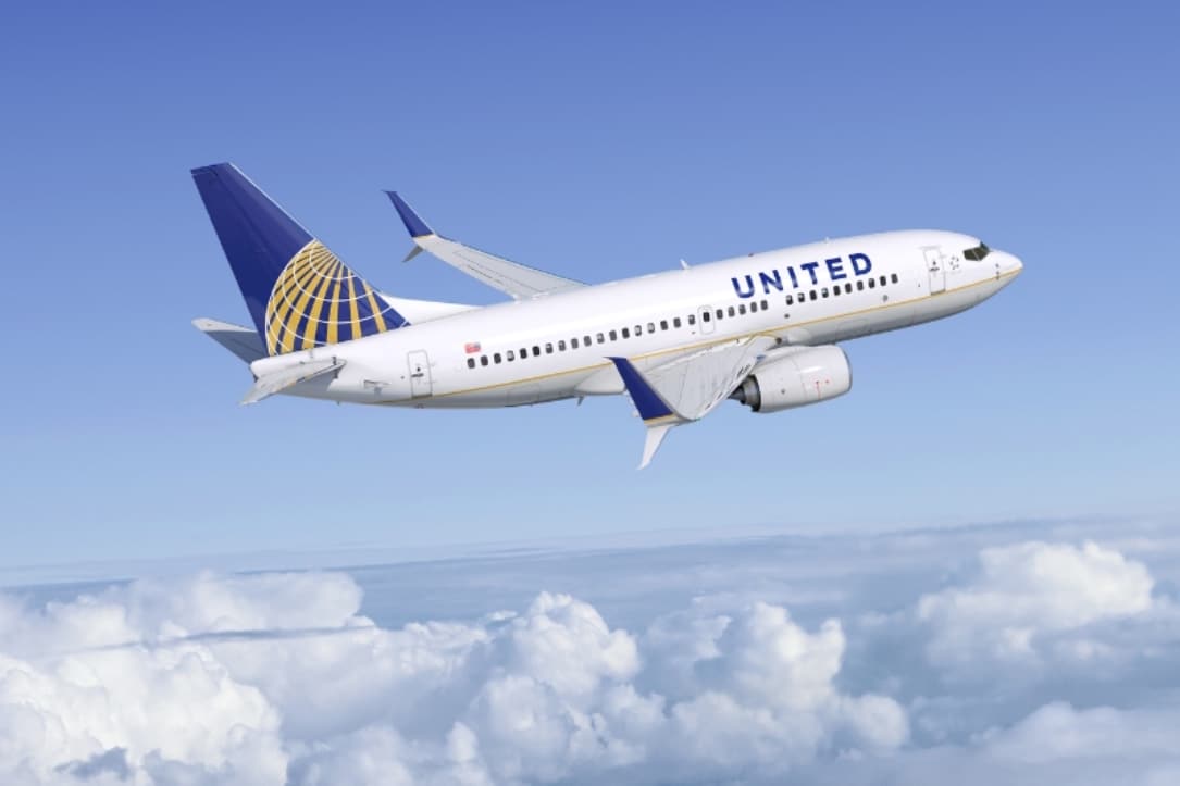 United scraps change fees